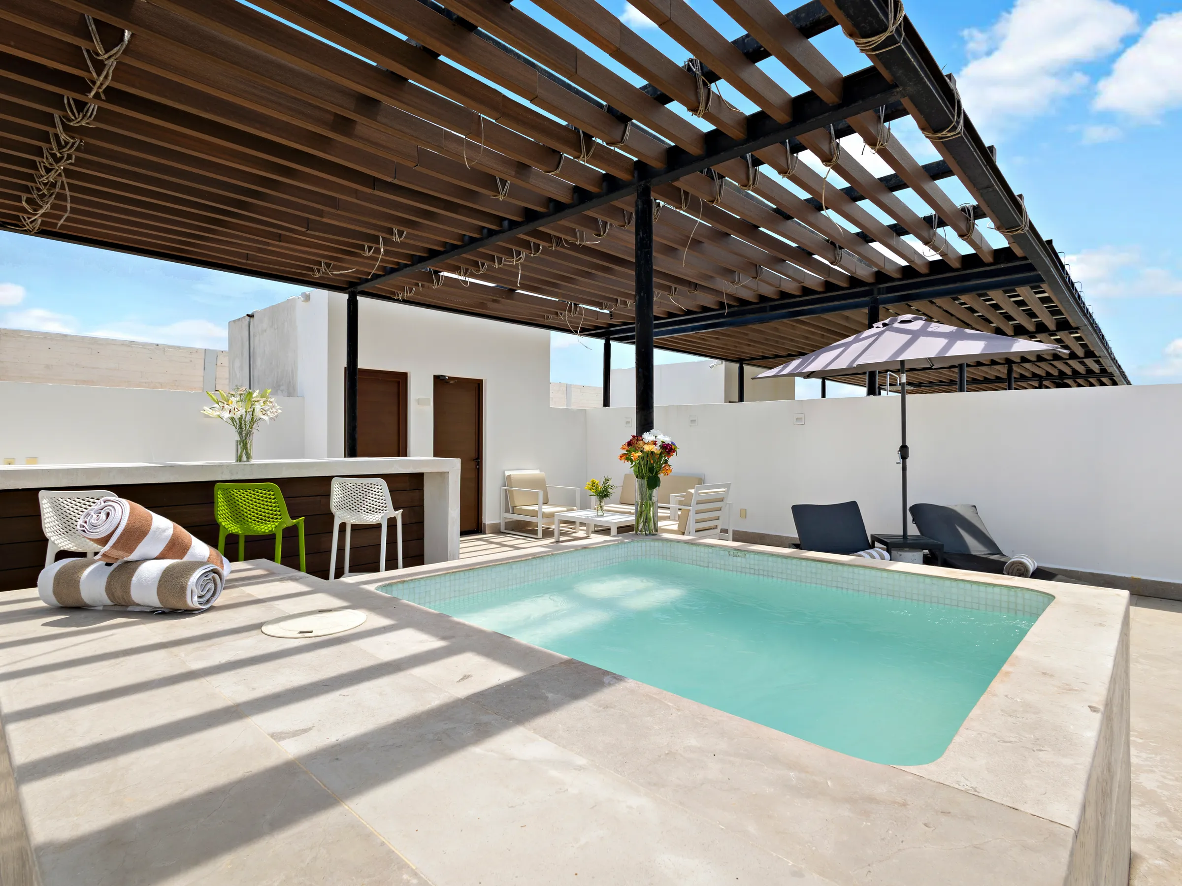 Penthouse 511 terrace at Oceana by Corax, with a hot tub and wooden pergola